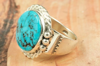 Genuine Sleeping Beauty Turquoise set in Sterling Silver. The Sleeping Beauty Turquoise mine is located in Gila County, Arizona. Created by Navajo Artist Tony Garcia. Signed by the artist.
